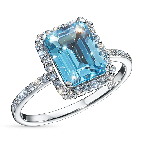 Кольцо из белого золота с топазом