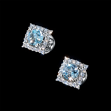 Пусеты из белого золота с топазами и бриллиантами