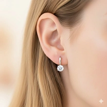 Серьги из белого золота с бриллиантом