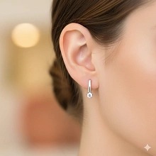 Серьги из белого золота с бриллиантом